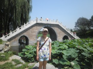 Nina in front of a bridge at the Old Summer Palace.