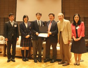 Dr. Perry and Dr. Potter congratulate participants from Soka Senior High School with Masako Toki, CIF project manager
