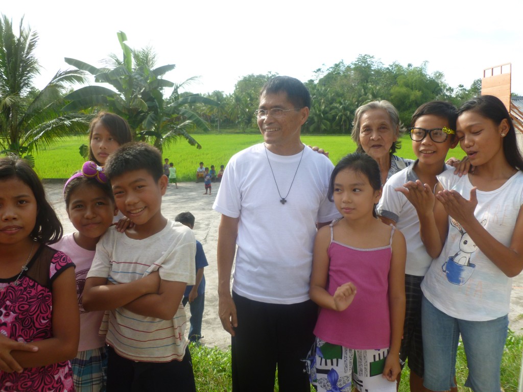 Father Bert in Barangay Nalapan