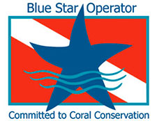 A logo of a Red flag with a diagional white stripe behin a large blue star and 3 waves vertically placed on the bottom half of the star.  The words "Blue Star Operator' is above the flag  and "Committed to Coral Conservation" is below. 